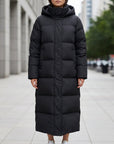 Women's black long quilted puffer parka