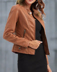 Women's red leather biker jacket with zip pockets