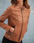 Women's red leather biker jacket with zip pockets