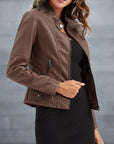 Women's red leather biker jacket with zip pockets