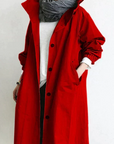 Women's grey waterproof raincoat with oversized hood