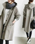 Women's grey waterproof raincoat with oversized hood