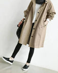 Women's grey waterproof raincoat with oversized hood
