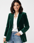 Women's green velvet blazer with gold-tone buttons