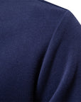 Men's blue long-sleeve knit polo jumper with classic collar
