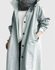 Women's light grey oversized hooded parka with adjustable hood