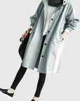 Women's light grey oversized hooded parka with adjustable hood