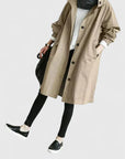 Women's light grey oversized hooded parka with adjustable hood