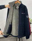 Men's navy outdoor fleece jacket with full zip and high collar