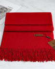 Women's red cashmere scarf with tassel trim