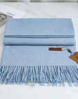 Women's sky blue cashmere scarf with tassel trim