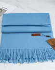 Women's blue cashmere scarf with tassel trim