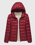 Women's dark blue ultra-light quilted hooded jacket