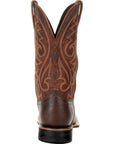 Men's brown cowboy boots with decorative western stitching and classic pointed toe