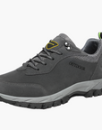 Men's waterproof hiking shoes in grey with cushioned sole and trail grip