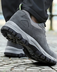 Men's waterproof hiking shoes in grey with cushioned sole and trail grip