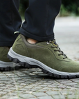 Men's waterproof hiking shoes in grey with cushioned sole and trail grip