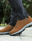 Men's waterproof hiking shoes in grey with cushioned sole and trail grip