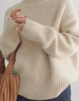 Women's beige oversized cashmere turtleneck jumper