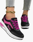 Women's orthopedic sneakers in black with supportive air cushion footbed