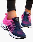 Women's orthopedic sneakers in pink and blue with cushioned supportive sole