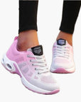 Women's orthopedic sneakers in pink and blue with cushioned supportive sole