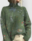 Women's green turtleneck knit jumper with relaxed fit