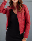 Women's red leather biker jacket with zip pockets