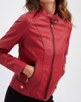 Women's red leather biker jacket with zip pockets