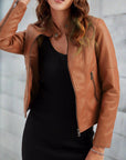 Women's red leather biker jacket with zip pockets