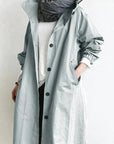 Women's grey waterproof raincoat with oversized hood