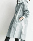 Women's grey waterproof raincoat with oversized hood