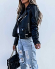 Women's red leather jacket with high collar and waist belt