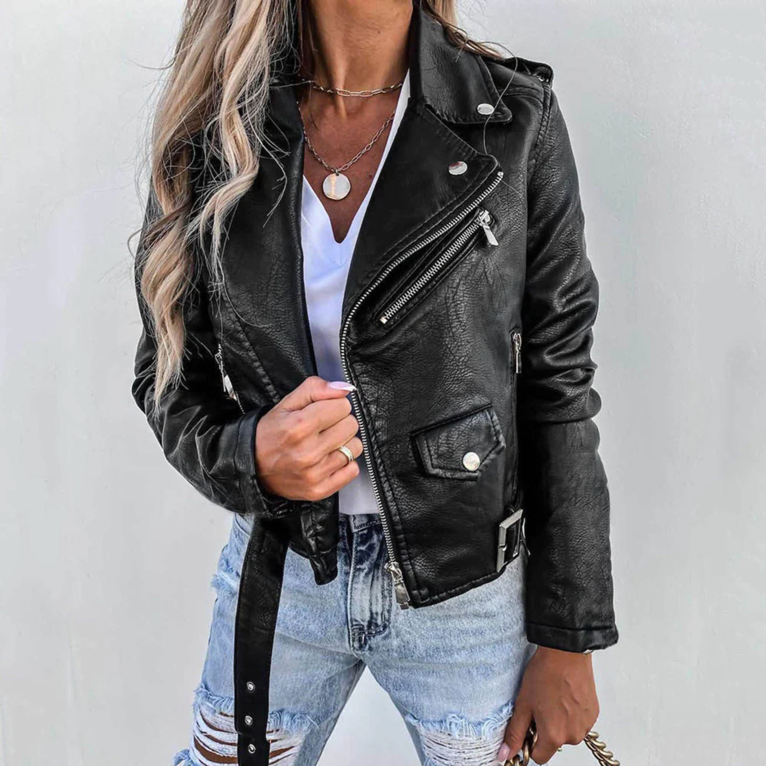 Women's red leather jacket with high collar and waist belt
