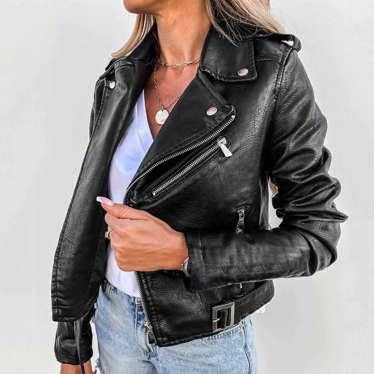 Women's red leather jacket with high collar and waist belt
