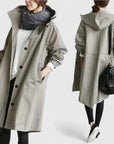 Women's light grey oversized hooded parka with adjustable hood