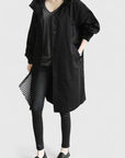 Women's light grey oversized hooded parka with adjustable hood