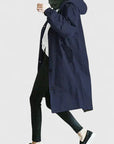 Women's light grey oversized hooded parka with adjustable hood