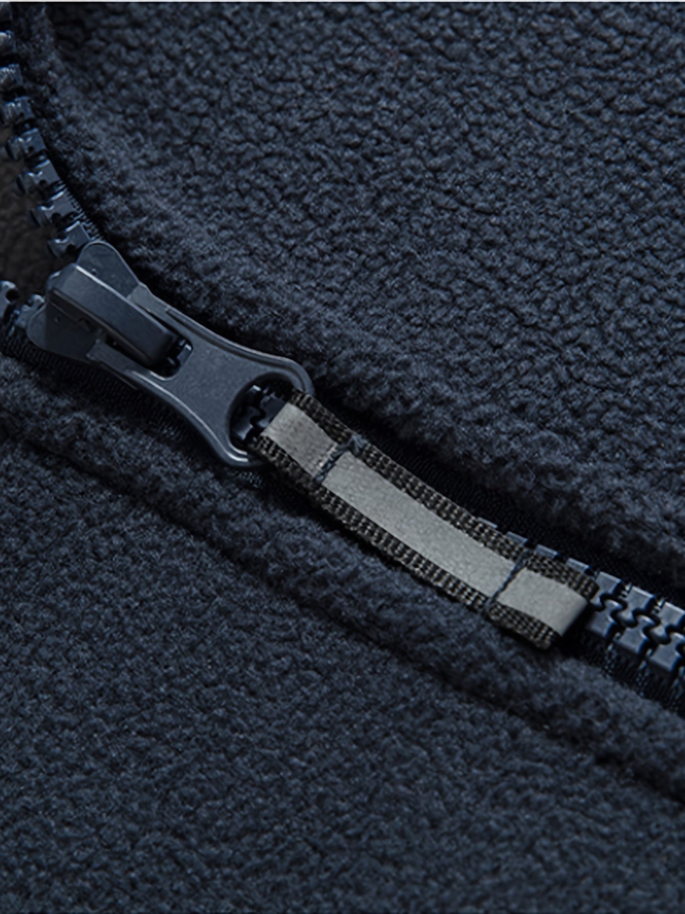 Men's navy outdoor fleece jacket with full zip and high collar