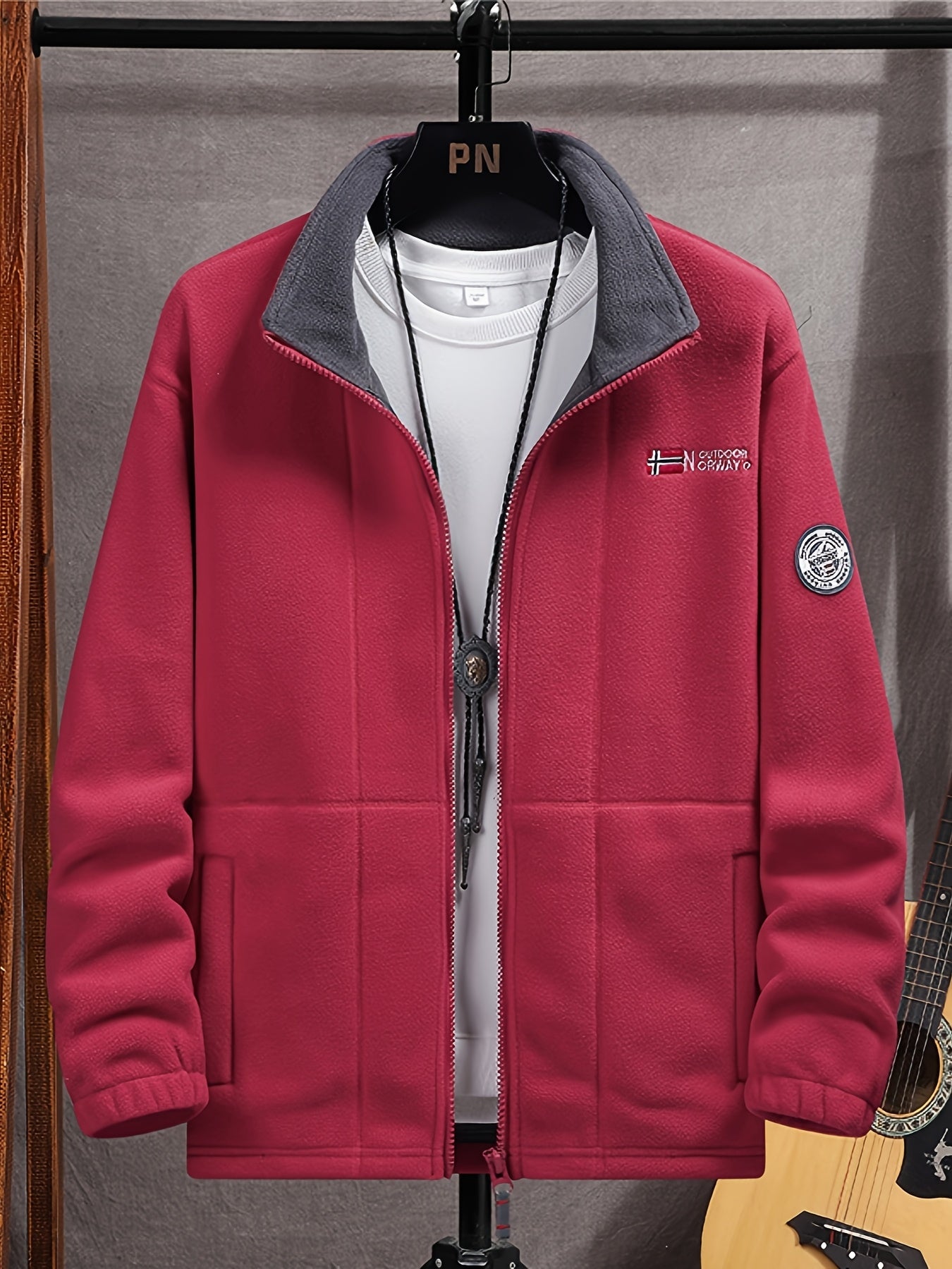 Men's navy outdoor fleece jacket with full zip and high collar