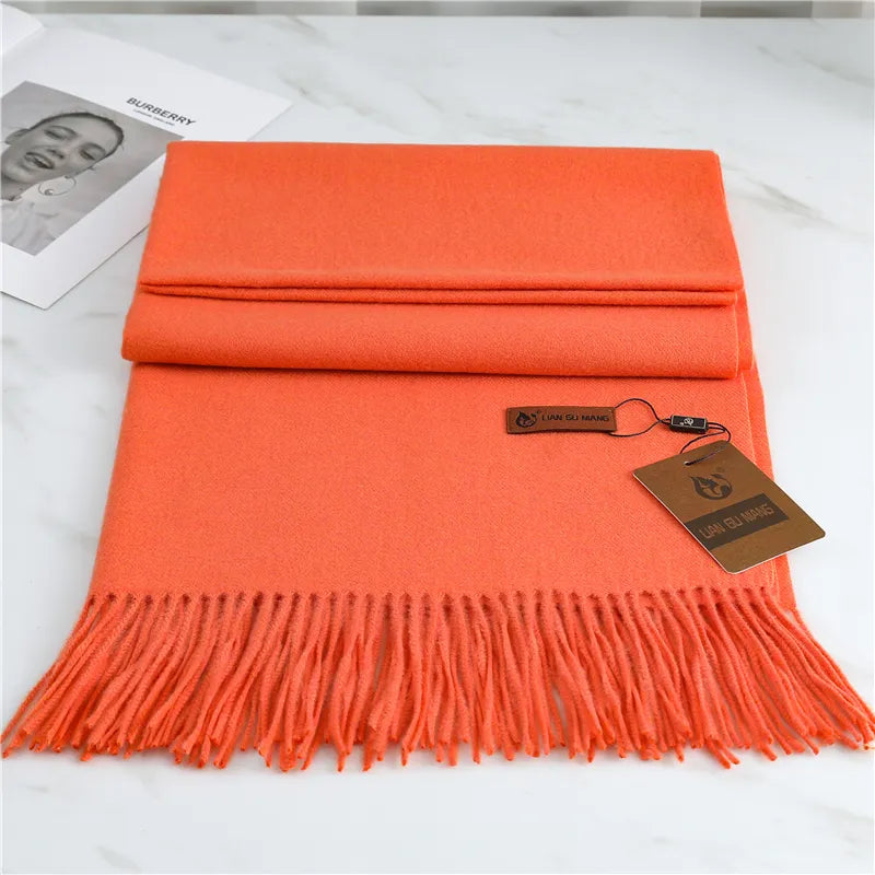 Women's orange cashmere scarf with tassel trim