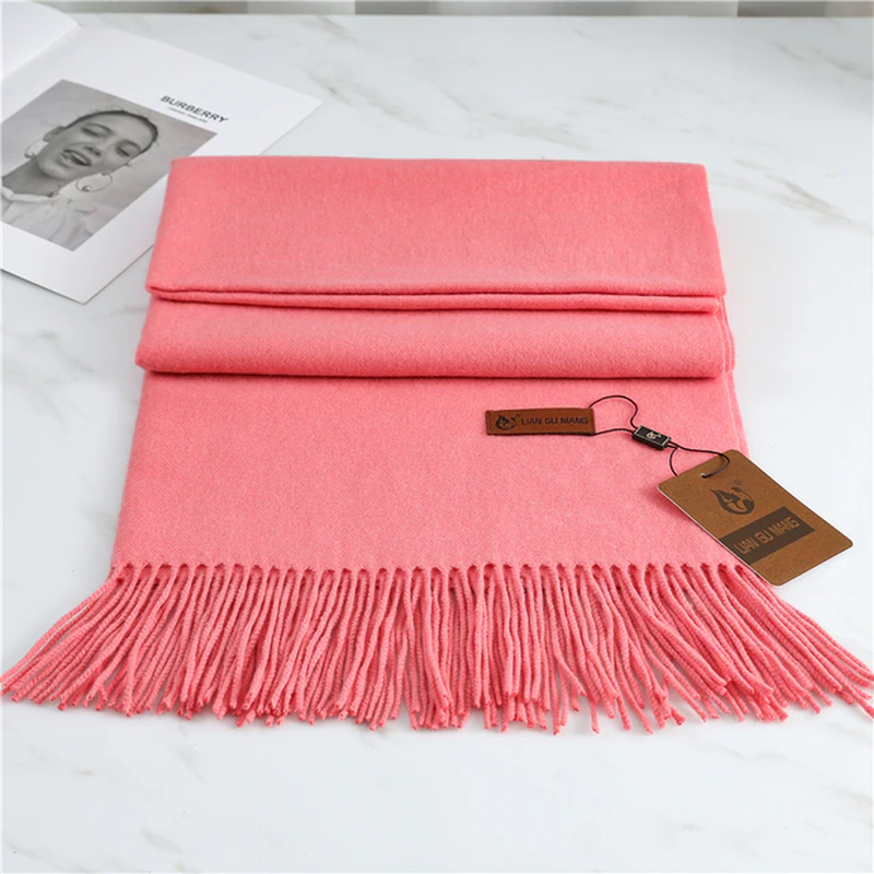 Women's pink cashmere scarf with tassel trim