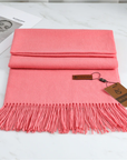 Women's pink cashmere scarf with tassel trim
