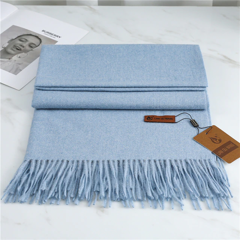 Women's sky blue cashmere scarf with tassel trim
