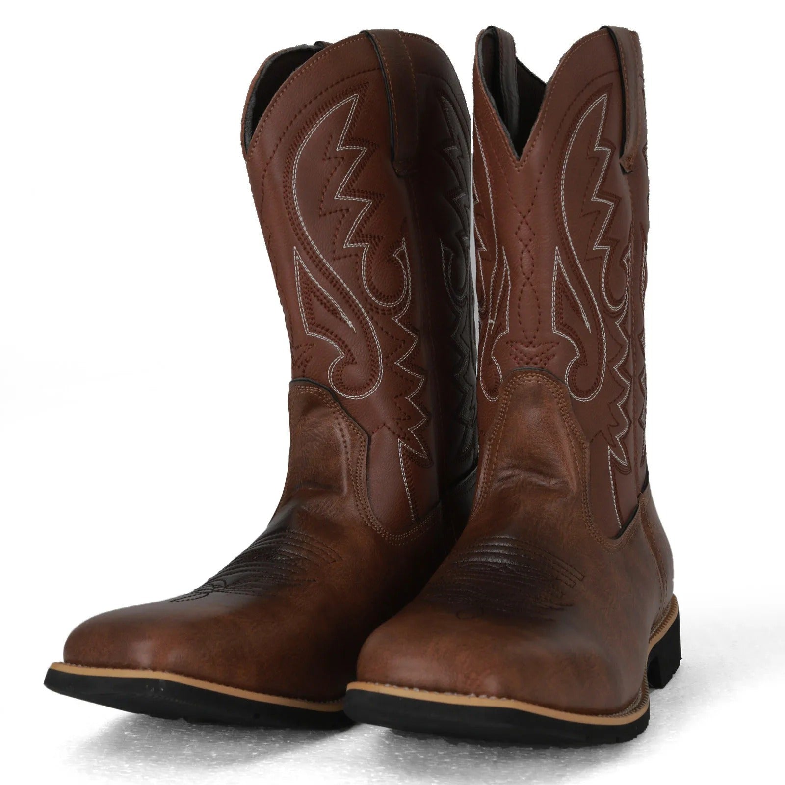 Men's brown cowboy boots with decorative western stitching and classic pointed toe