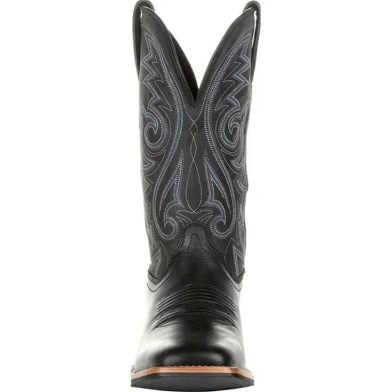 Men's brown cowboy boots with decorative western stitching and classic pointed toe