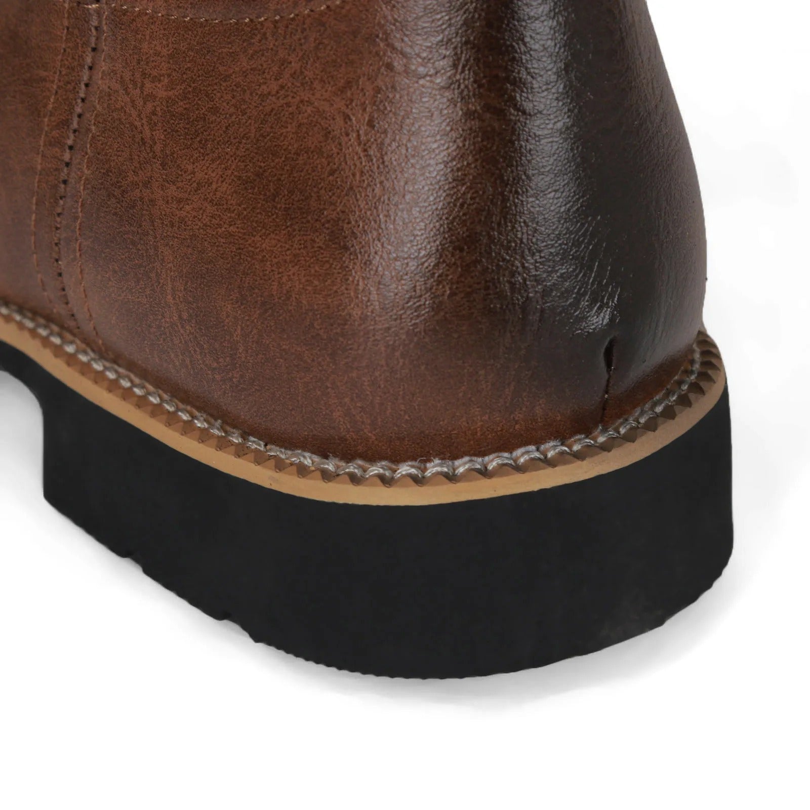 Men's brown cowboy boots with decorative western stitching and classic pointed toe