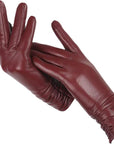 Women's navy blue faux leather gloves with wool lining