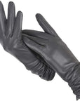 Women's navy blue faux leather gloves with wool lining