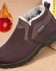 Men's black slip-on shoes with plush warm lining for winter home and casual wear